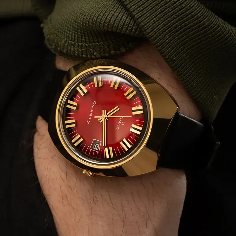 Timex 1972 Reissue Burgundy Dial Gold Bezel Men's Watch- TW2V25400 watch side profile and crown